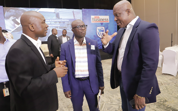 Ato Afful (right), Managing Director, GCGL, interacting with Prof. Godfred Bokpin (left), an economist and professor of finance at the University of Ghana. With them is Eric Amponsah, tax consultant Picture: SAMUEL TEI ADANO Ato Afful (right), Managing Director, GCGL, interacting with Prof. Godfred Bokpin (left), an economist and professor of finance at the University of Ghana. With them is Eric Amponsah, tax consultant Picture: SAMUEL TEI ADANO